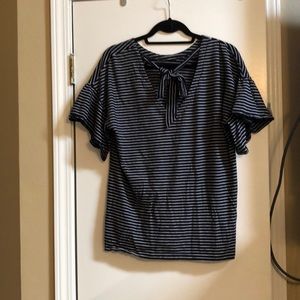 Banana Rep top w/ ruffle sleeves & tie backdetail.